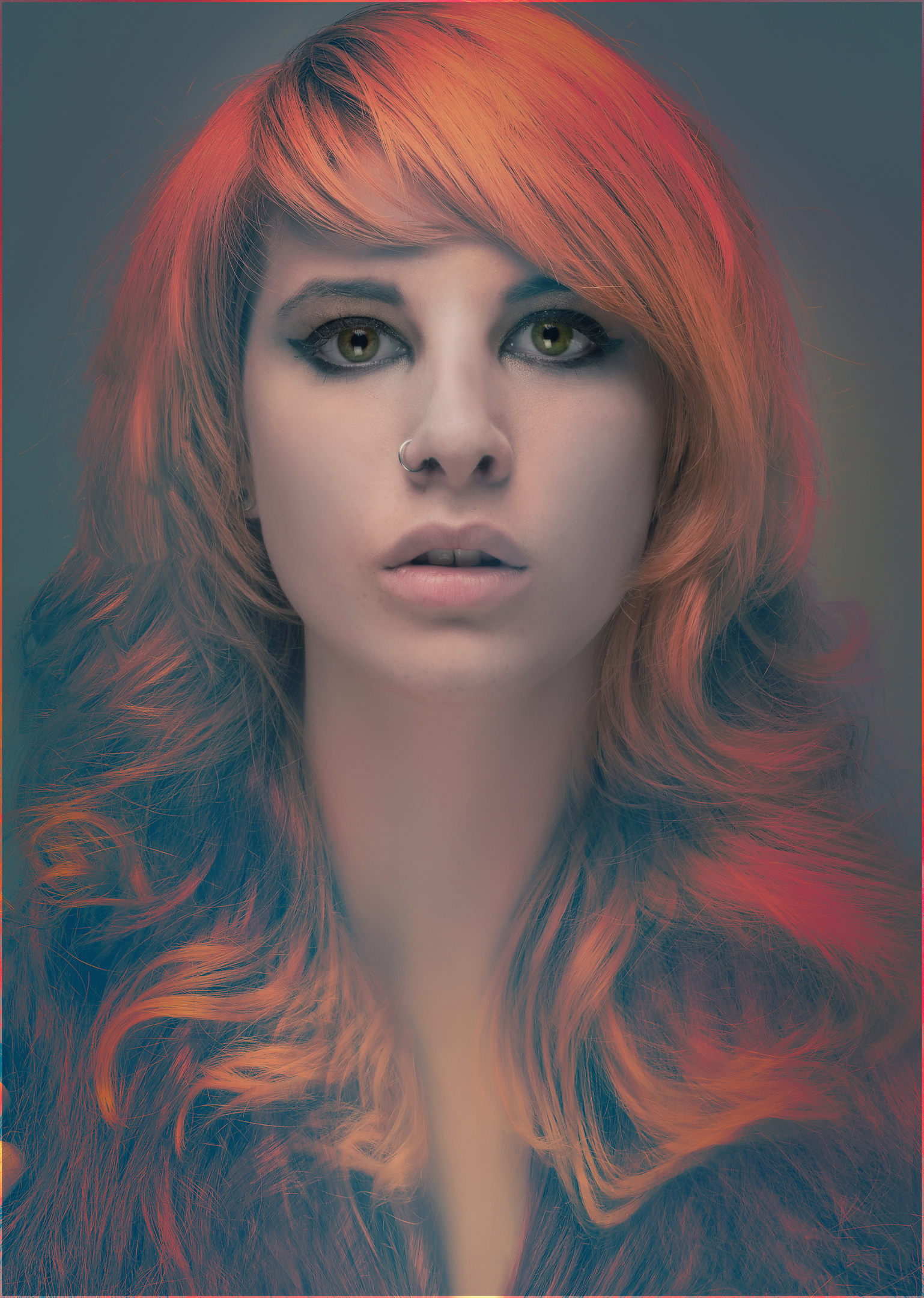 Graphic portrait with orange and cyan color treatment