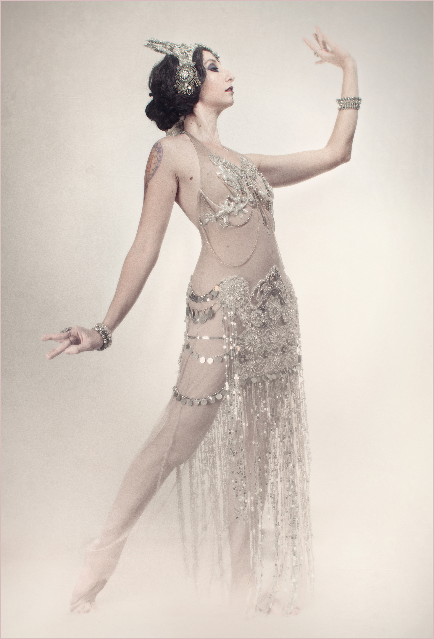 Pale theatrical portrait inspired by Mata Hari