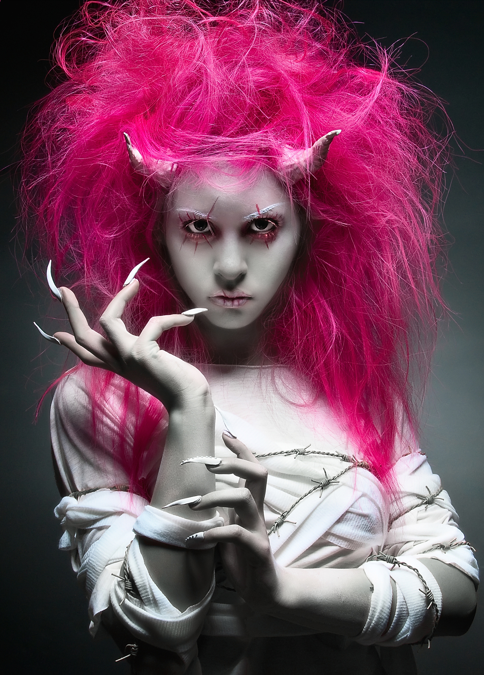 Surreal portrait with vivid magenta hair
